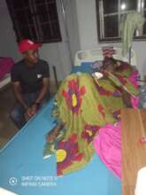 Our Project Leader discussing with the woman