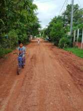 Child is happy to travel the new fixing road