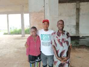 Our Project Leader with the orphan and guardian