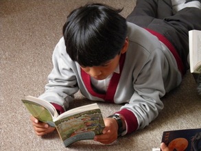 Reading "Magic Tree House"!