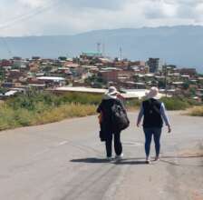 Tukuy Pacha staff walking toward family visits