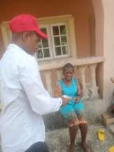 Our Project Leader supporting the poor widows
