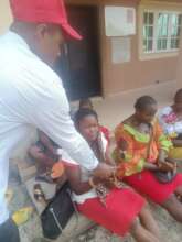 Our Project Leader supporting the poor widows