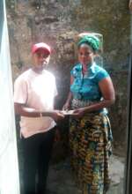 Our Project Leader supporting a poor widow