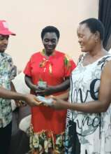 Our Project Leader financially supporting a widow