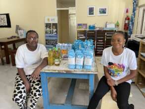 Distributing food at a CCC home group meeting