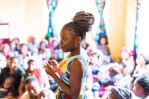 A mom, sharing on opening day at Kabanana CCC