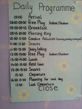 A daily programme displayed on the wall