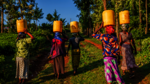 African Women Doing Their Chores