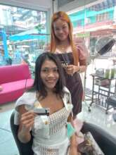 Woman with Voucher in the Hair Salon