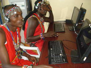 Maasai morans using the computers