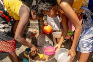 A students serving a meal