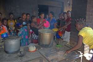 Students from female boarding school serving lunch