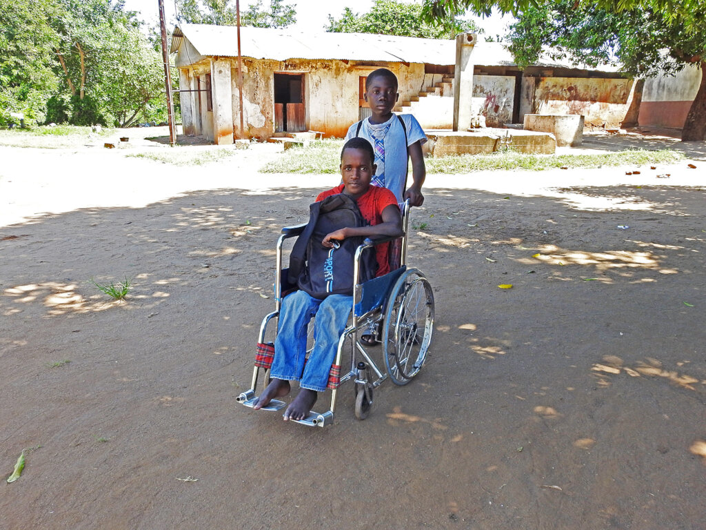 Disabled child and his friend - boarding students