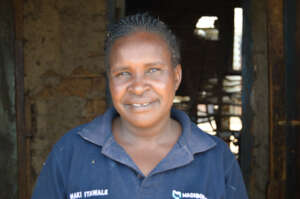 Joyce, in front of her store which sells petrol