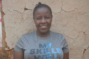 Naanyu outside her shop