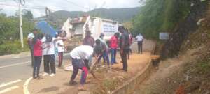 Tea Leaf students clear walkways and drainage