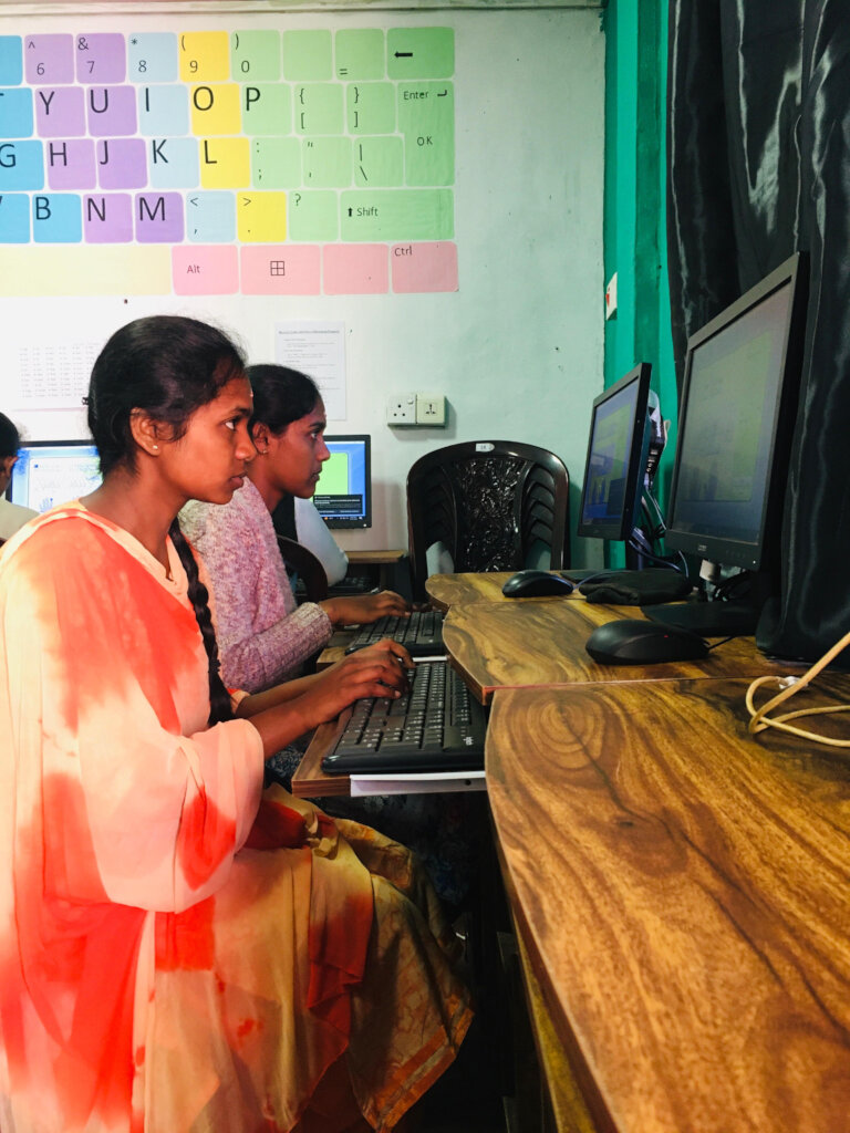 Students at TLC Ragala practising IT skills