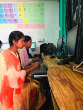 Students at TLC Ragala practising IT skills