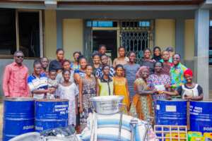A Group Photo of Beneficiaries and the items