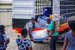 RUG Team Offloading Items from the truck