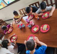 Children at the orphanage enjoy their tamale gifts