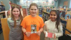 Students with Carl's picture and thank you note