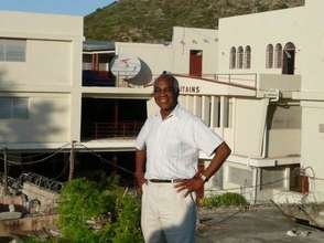 Dr. Mortel in front of Les Bons Samaritains