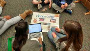 A Haitian culture poster being created