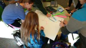 A Haitian technology poster being created