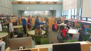 Middle school Ss presenting to elementary Ss