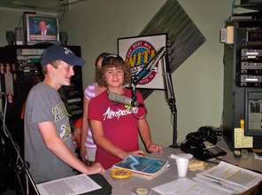 Sam at a radio promotion for our project