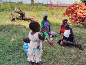 Expectant mothers waiting for food aid and relief