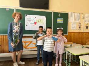 Returned students gifted flowers to their teacher