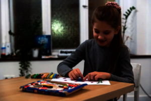 Zlata, creates art in Poland | Plan International