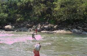 Survey team crosses the Dordi River