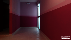 View of one of the painted rooms at Casa Materna