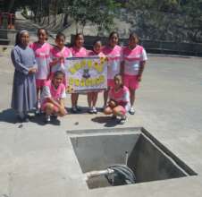 Children at Zona 13, Guatemala and the new pump