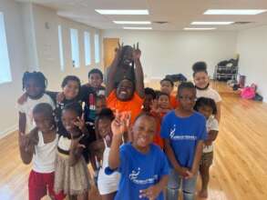 MindLeaps students with their teacher in the Bronx