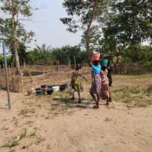 Transport of irrigation water by parents and pupil