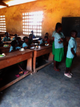 Pupils are eating vegetable's salad (M'Poko Bac)