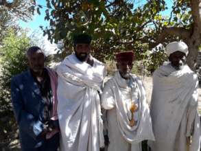 With elders and village opinion makers