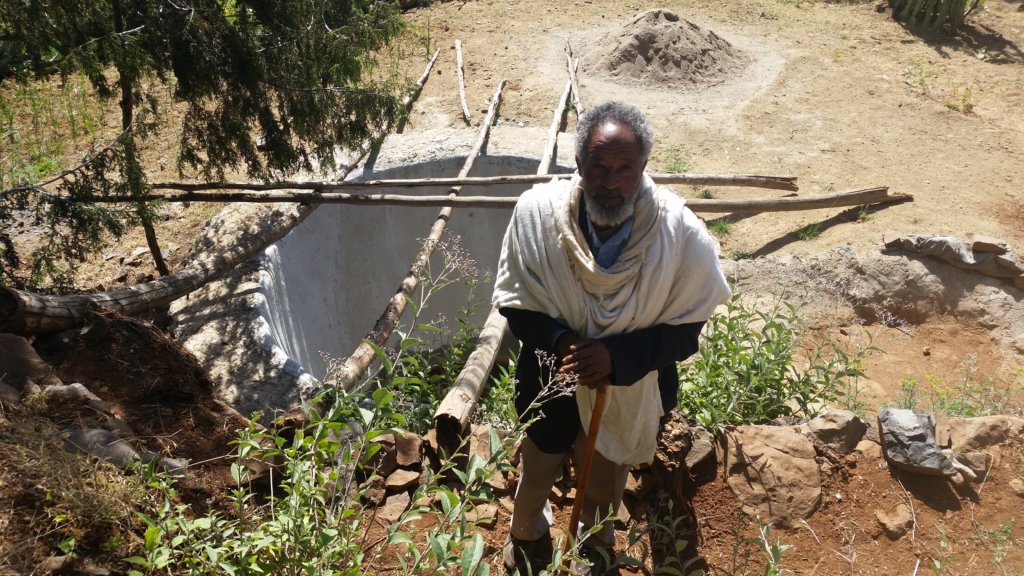 Hailu W Nerea building water pond - by A. Gebru