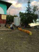 waiting for water brought by tankers