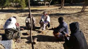 Elders discussing the repair, by Amanuel Gebru