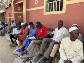 LI staff meet with community members