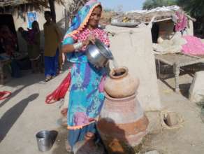 Women happily using Nadi filter