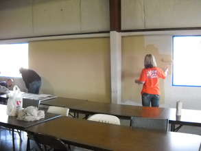 Team Depot repairs and repaints the walls