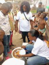 Feeding the street in Sapele in November 2024