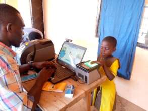 Officer capturing biometric details of a student